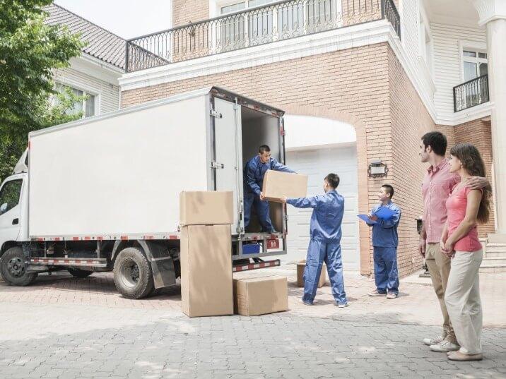 full-service moving crew organizing items for long distance transport in Woodland CA